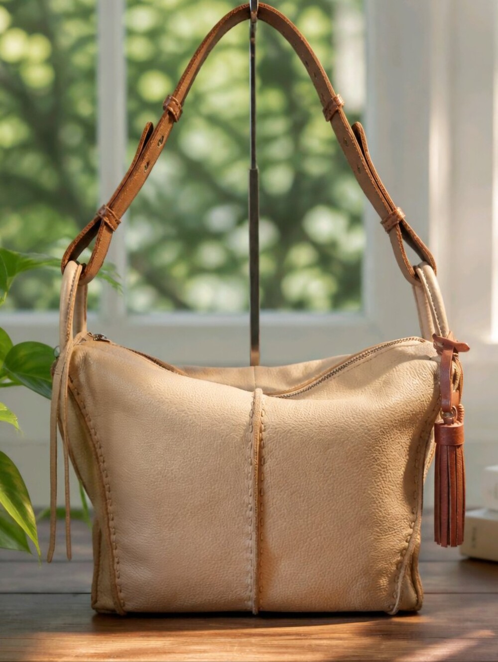The Sak, Los Feliz Hobo genuine leather shoulder bag in a soft butter yellow